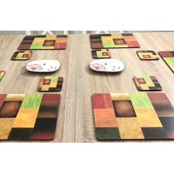 Close up of Majestic modern corkbacked placemats on wooden dining table by Plymouth Pottery