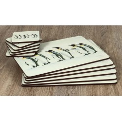 Set of 6 Penguin Parade placemats and drinks coasters by Plymouth Pottery fanned out